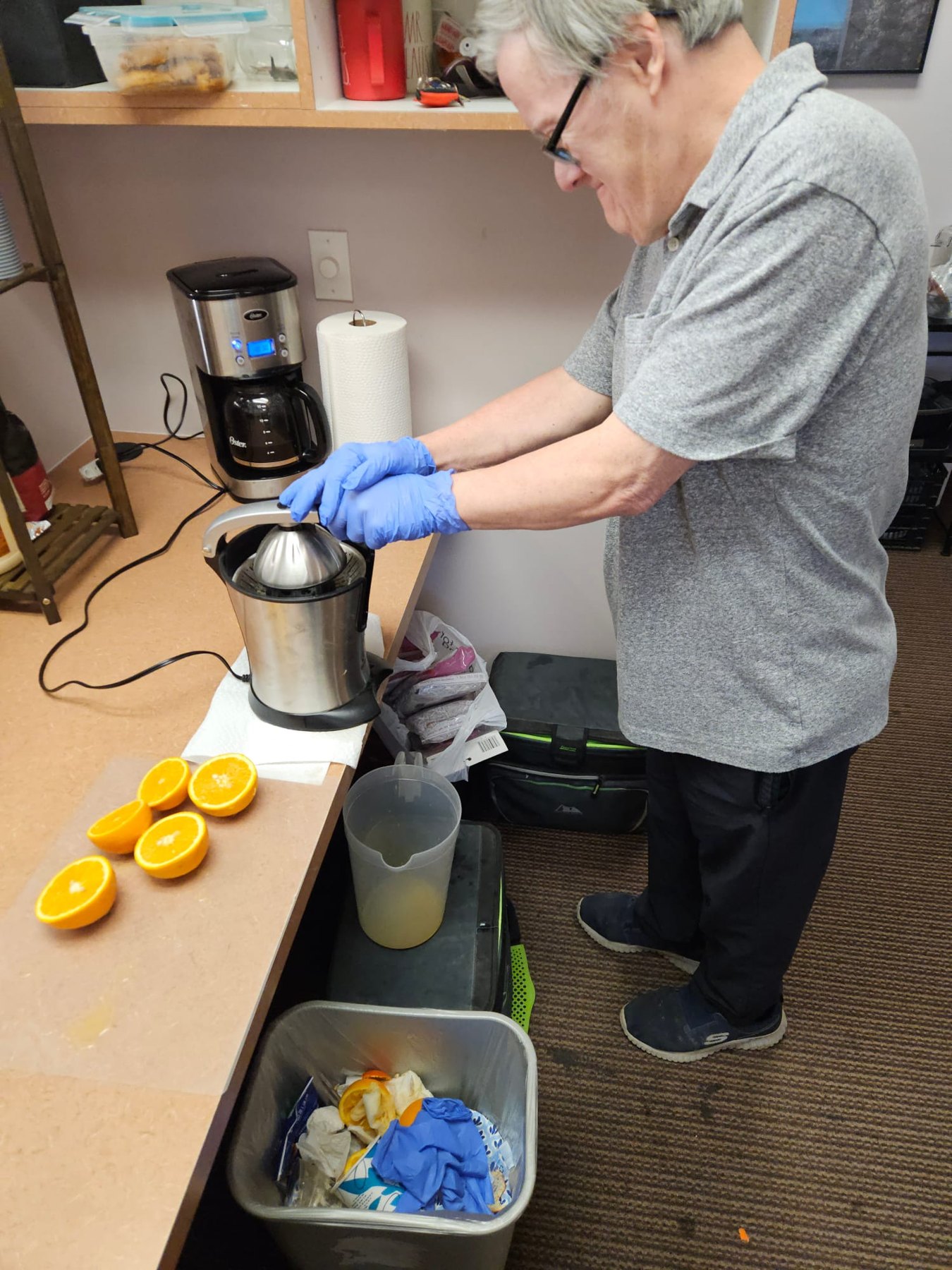 Preparing citrus at a kitchen counter