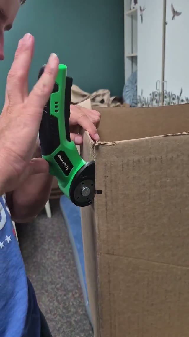 Trying a cardboard-cutting tool