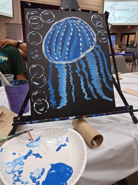 A jellyfish painting on display