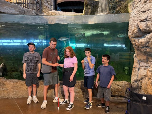 A group photo at the aquarium