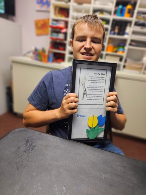 Proud of a colorful framed picture