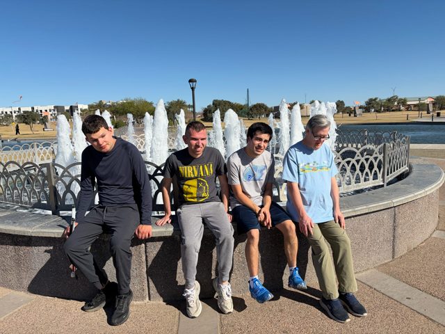 Friends together by the fountain